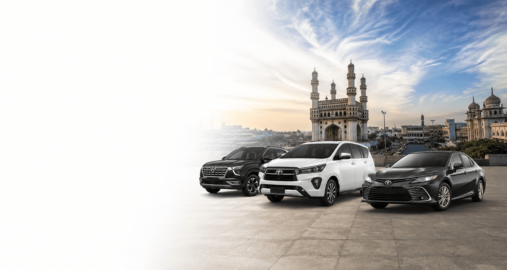 Fleet of rental cars in front of a city skyline